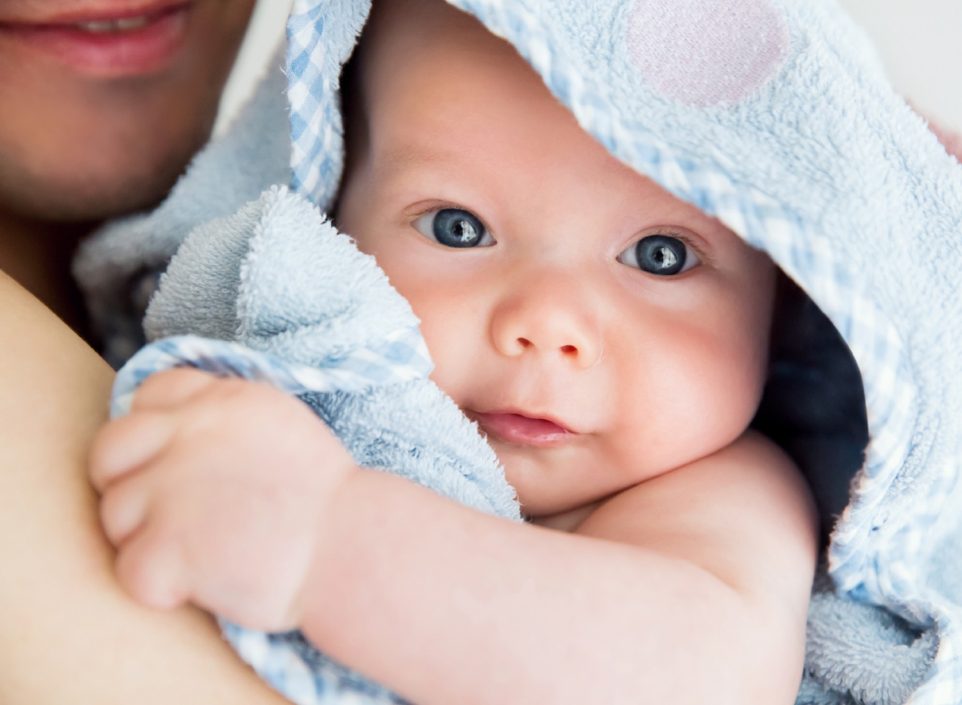 Baby wearing a hooded towel