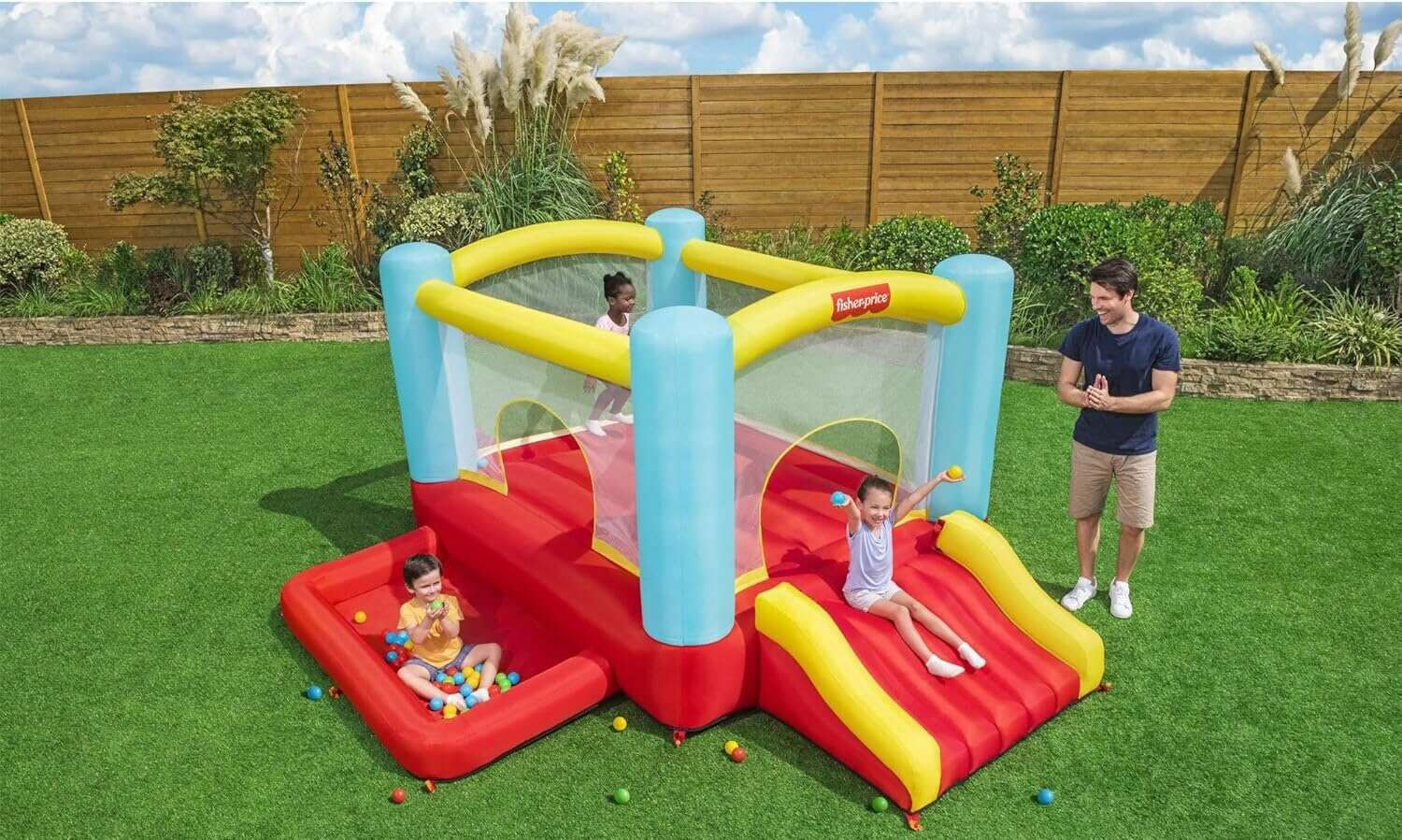 Three children on the Fisher-Price bounce house sold by Bestway on Amazon